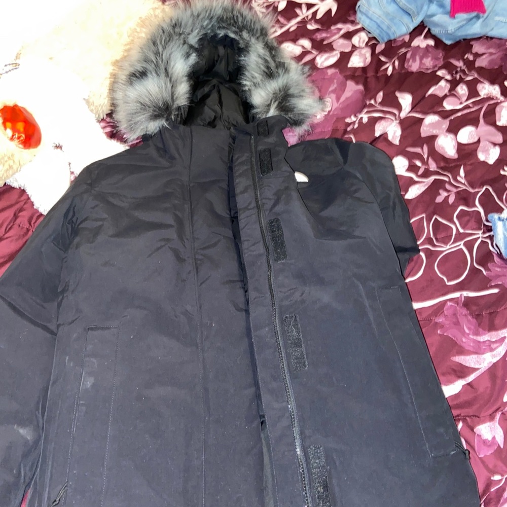 Black North Face winter coat, never wore before
